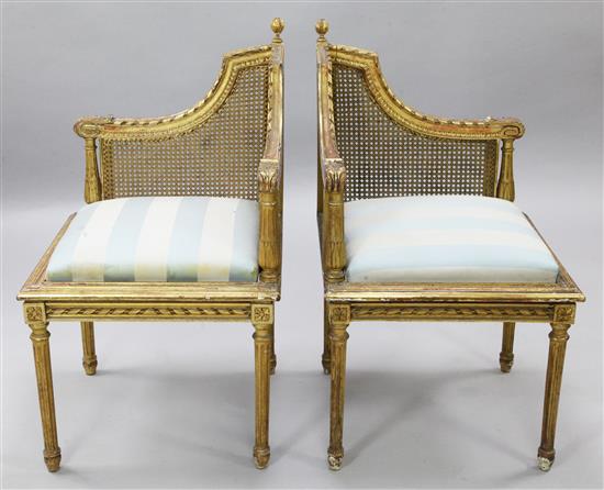 A pair of early 20th century giltwood corner chairs, H.2ft 9in.